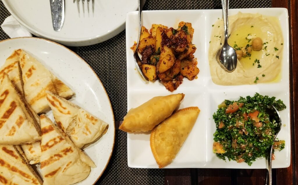 A platter of mediterranean dishes.