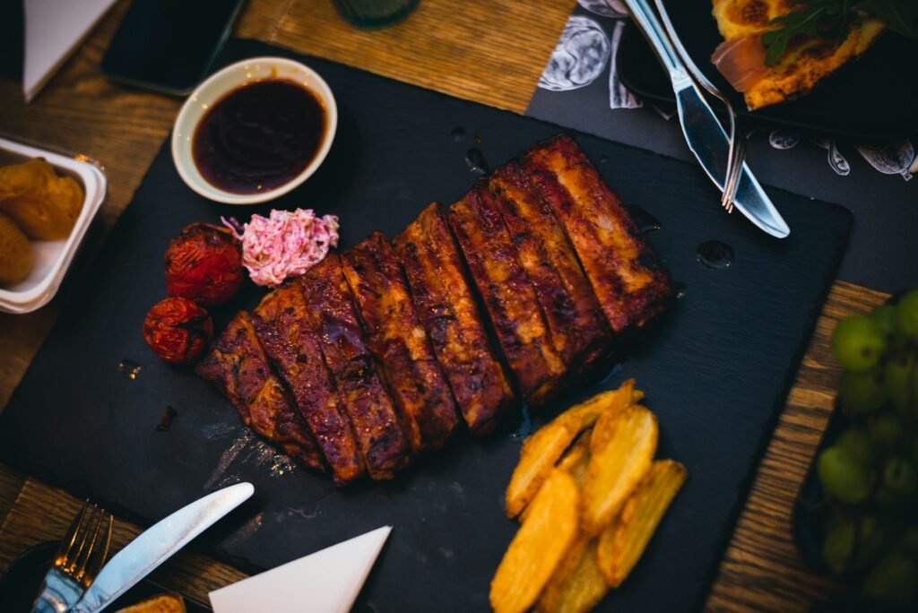 grilled meat on black plate