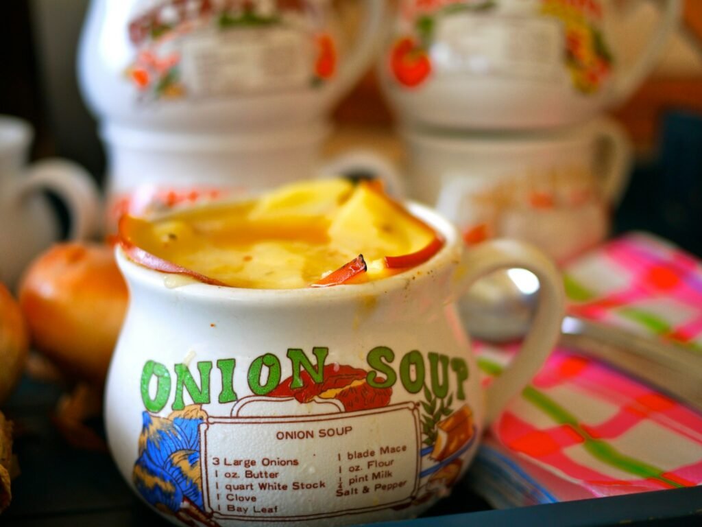 white and red ceramic mug